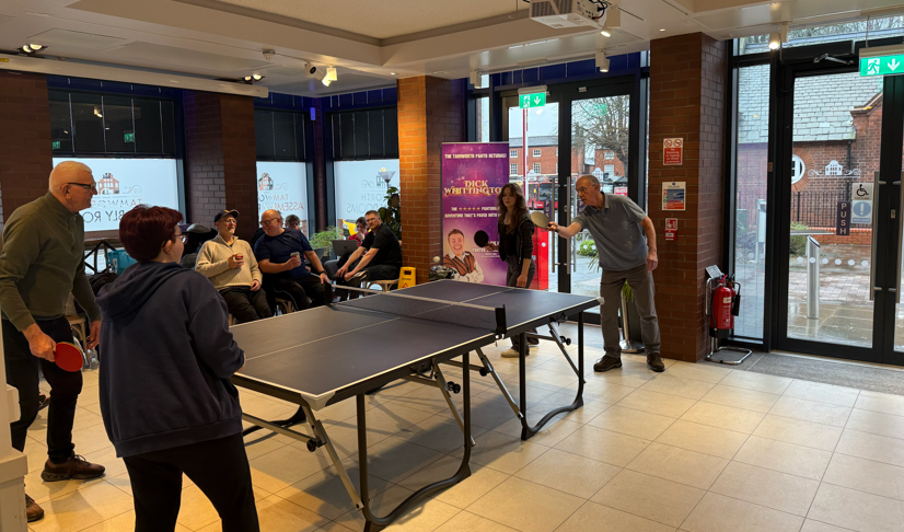 people playing table tennis